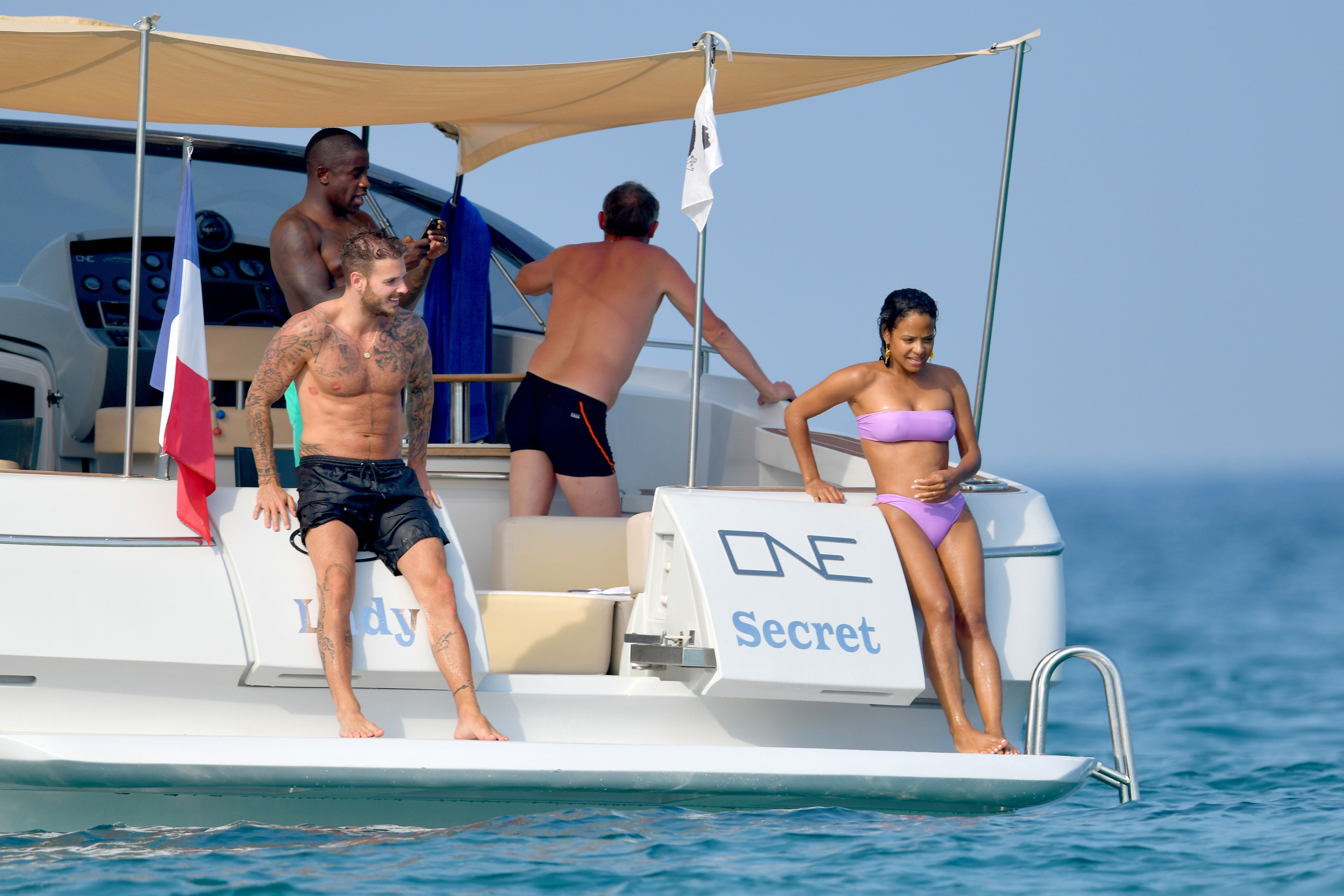 Christina Milian pokies and cameltoe in sexy bikini candids on a boat during holiday UHQ (43).jpg