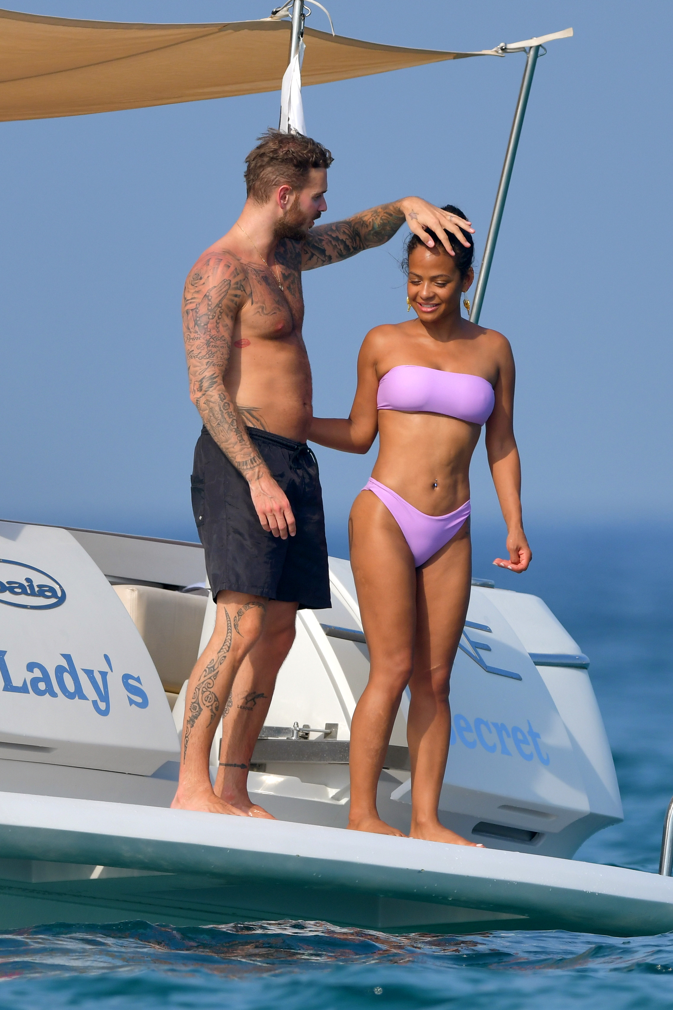 Christina Milian pokies and cameltoe in sexy bikini candids on a boat during holiday UHQ (21).jpg
