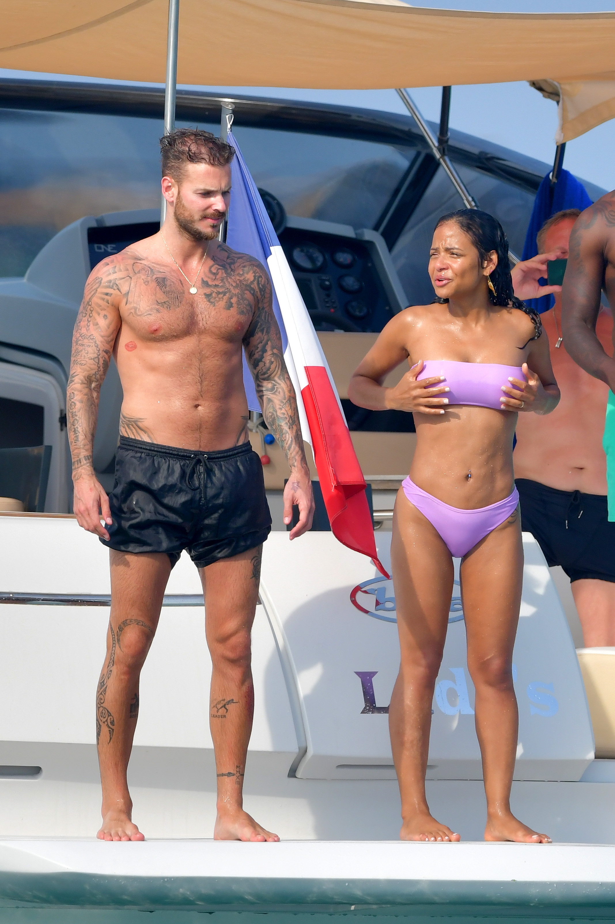 Christina Milian pokies and cameltoe in sexy bikini candids on a boat during holiday UHQ (51).jpg