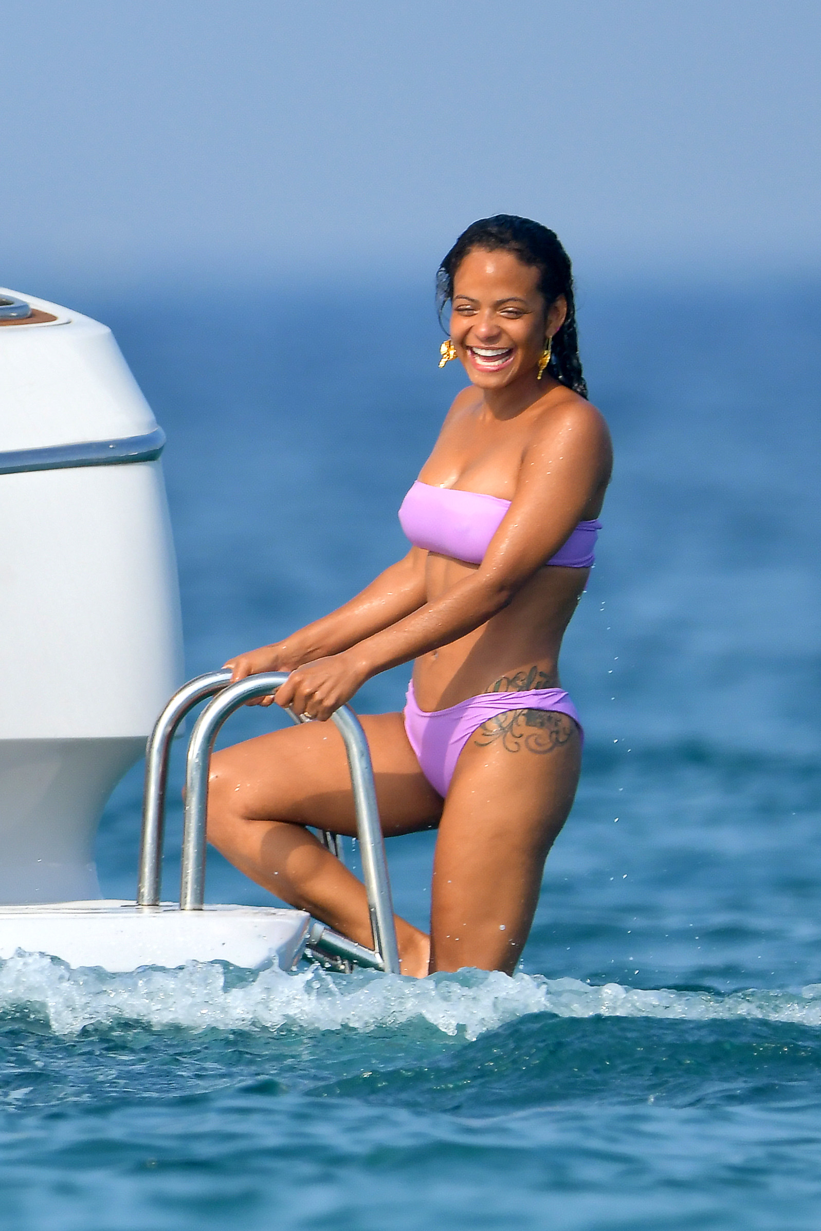 Christina Milian pokies and cameltoe in sexy bikini candids on a boat during holiday UHQ (37).jpg