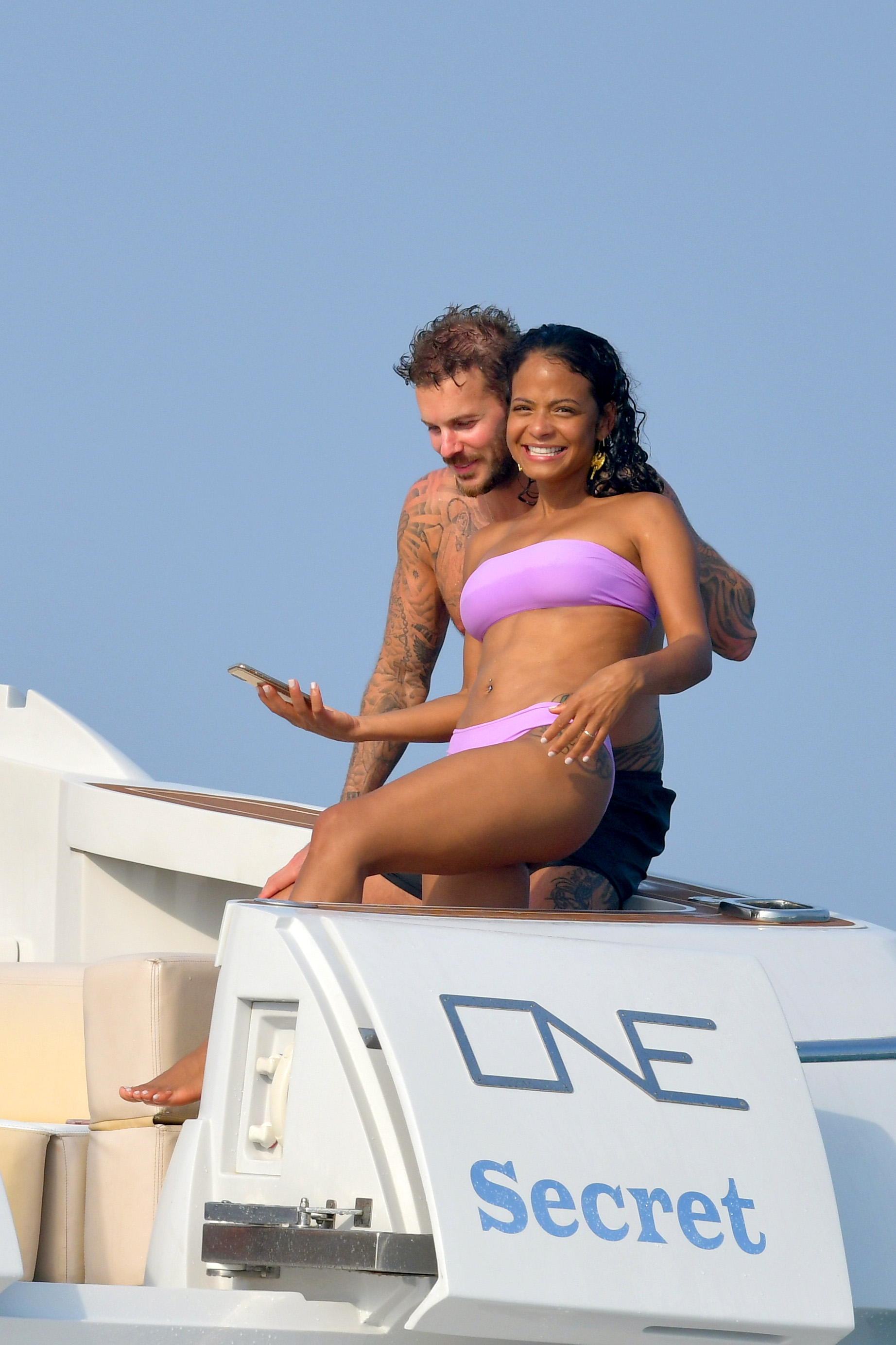 Christina Milian pokies and cameltoe in sexy bikini candids on a boat during holiday UHQ (11).jpg