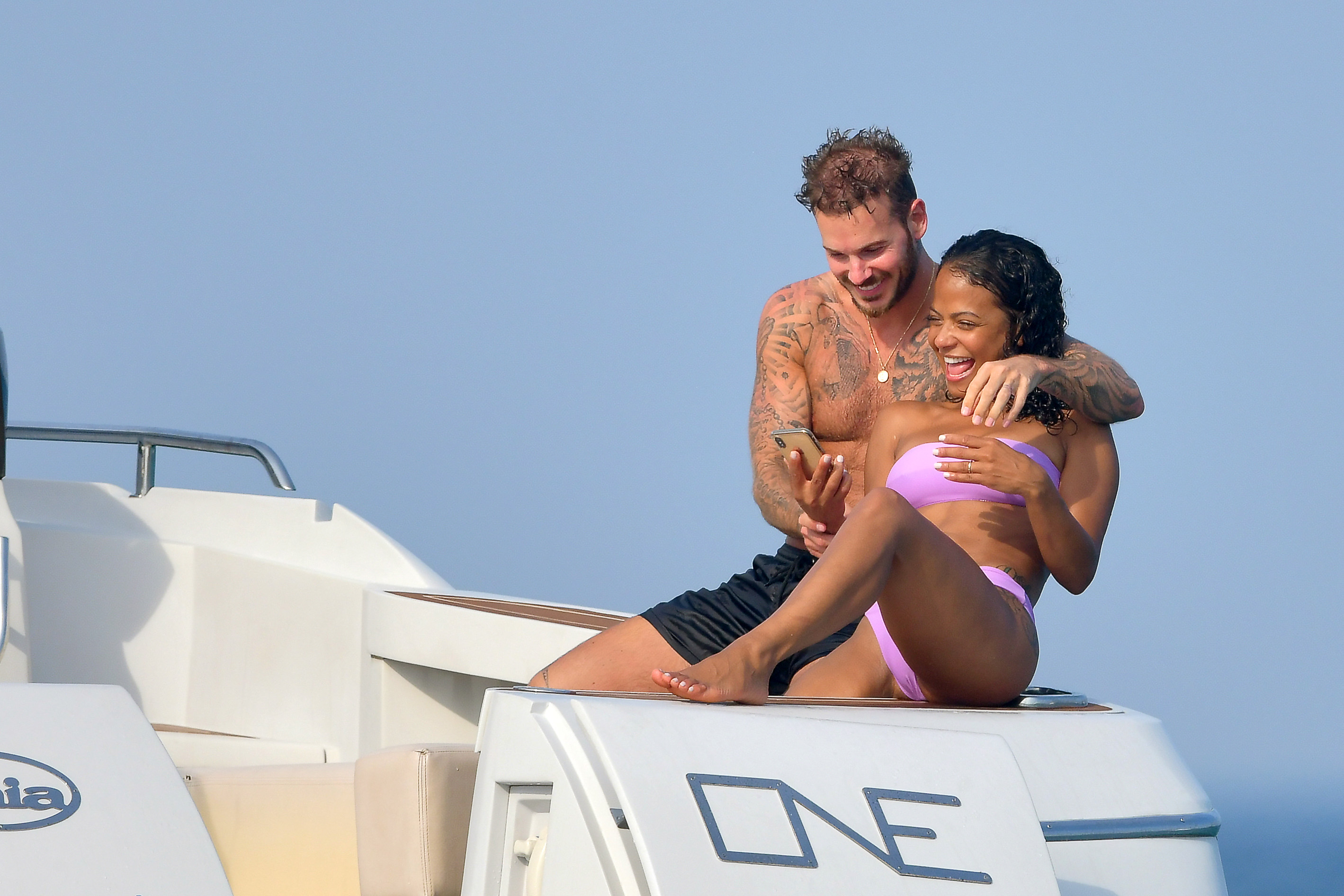 Christina Milian pokies and cameltoe in sexy bikini candids on a boat during holiday UHQ (16).jpg