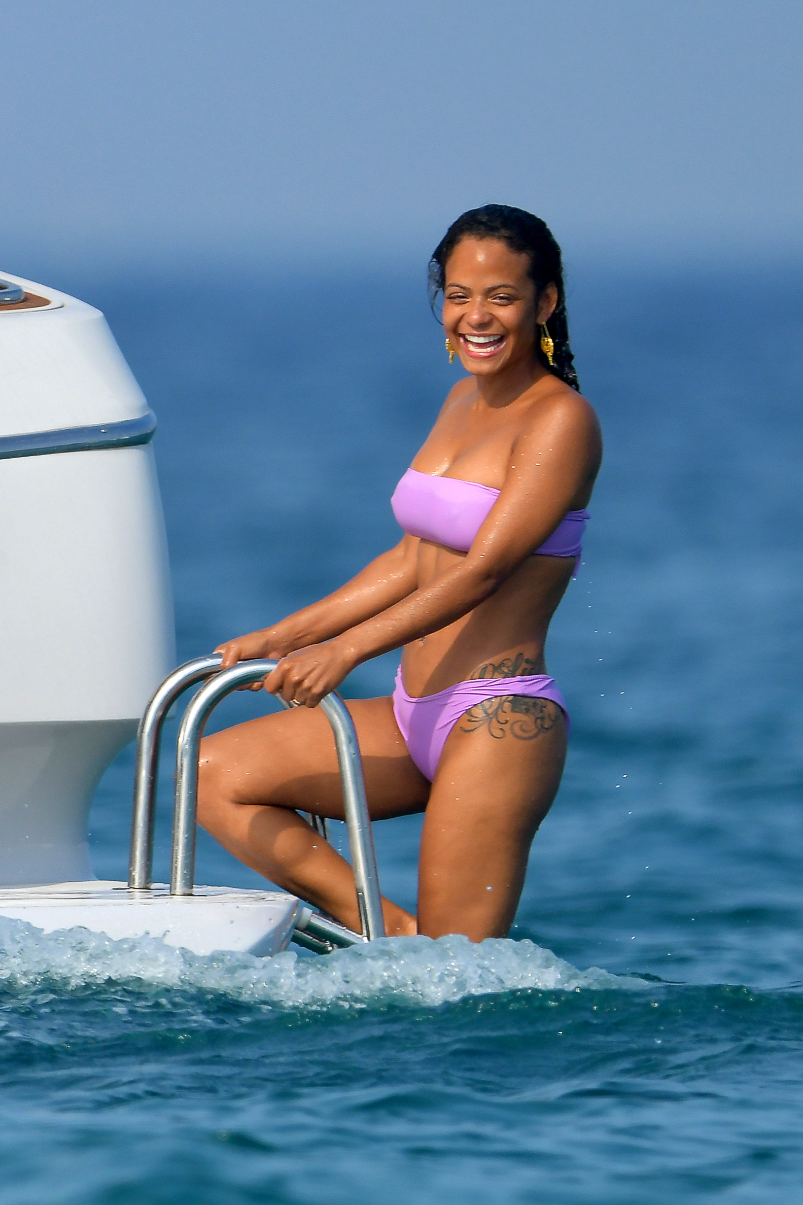 Christina Milian pokies and cameltoe in sexy bikini candids on a boat during holiday UHQ (39).jpg