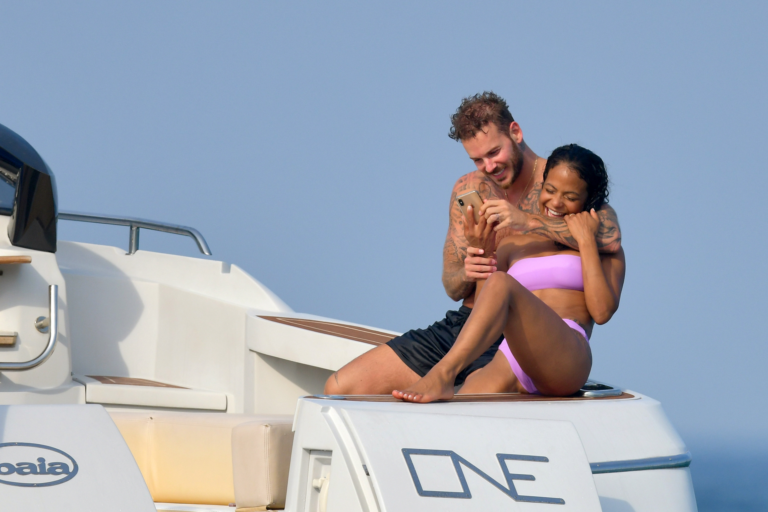 Christina Milian pokies and cameltoe in sexy bikini candids on a boat during holiday UHQ (17).jpg