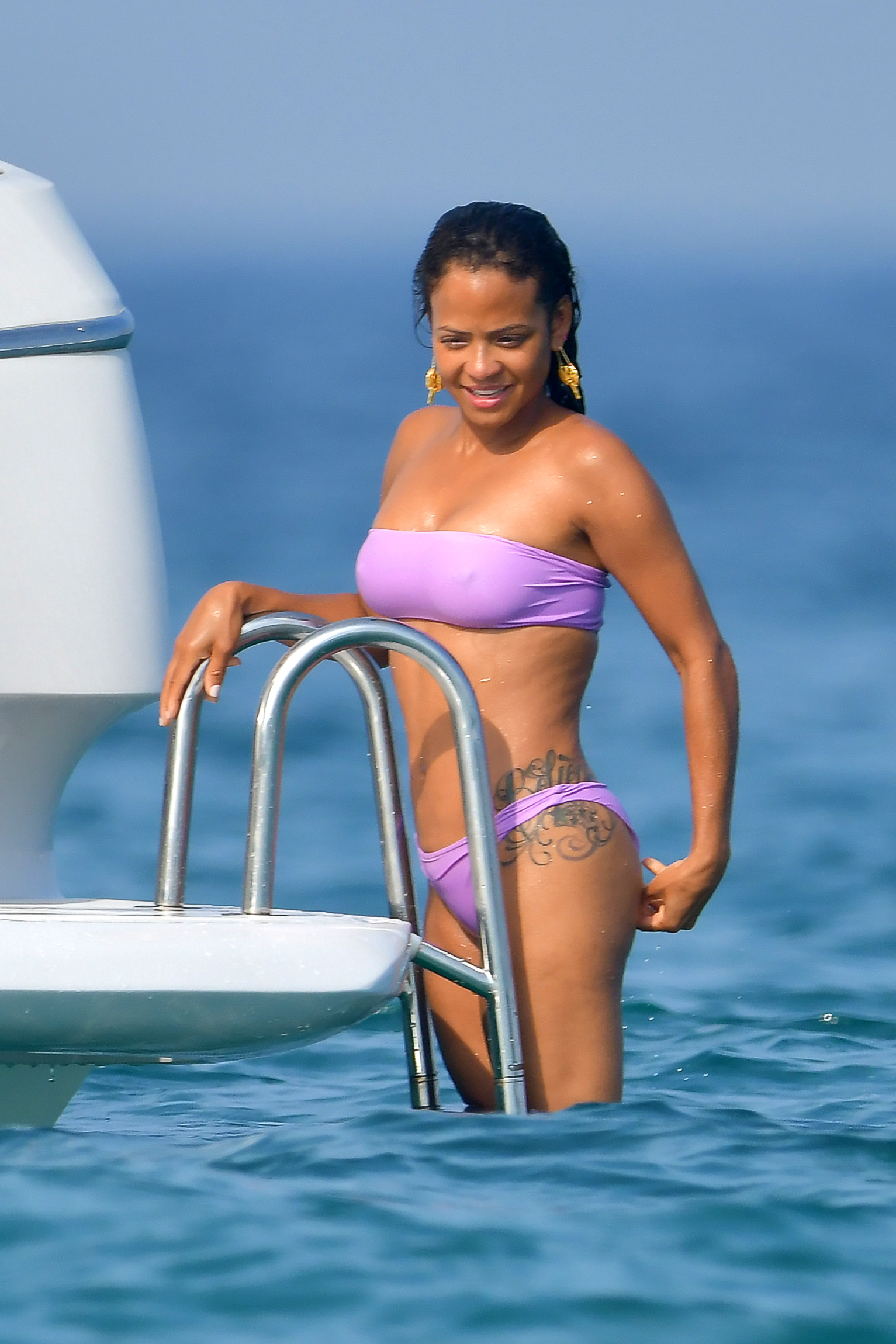 Christina Milian pokies and cameltoe in sexy bikini candids on a boat during holiday UHQ (35).jpg