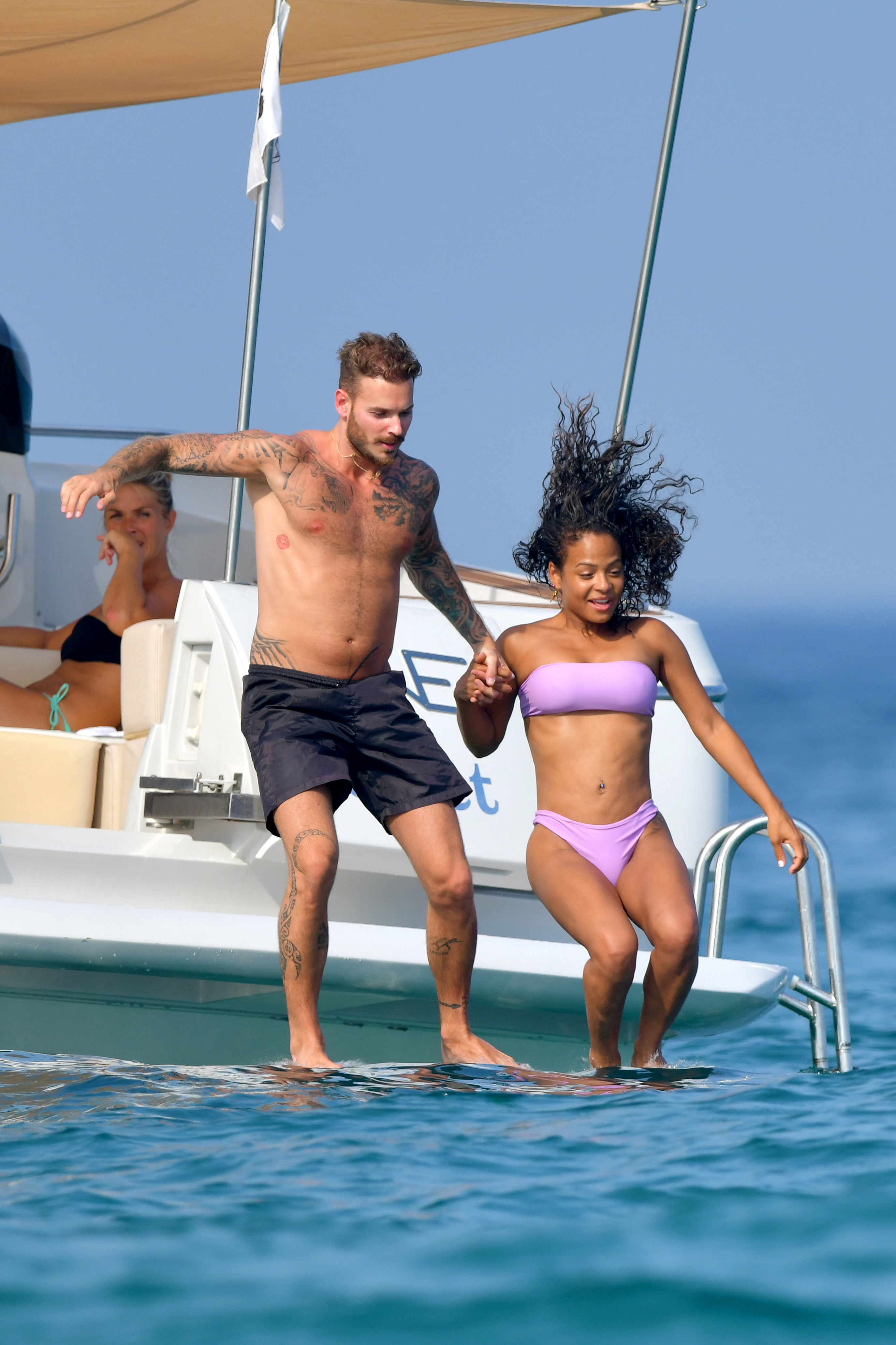 Christina Milian pokies and cameltoe in sexy bikini candids on a boat during holiday UHQ (33).jpg