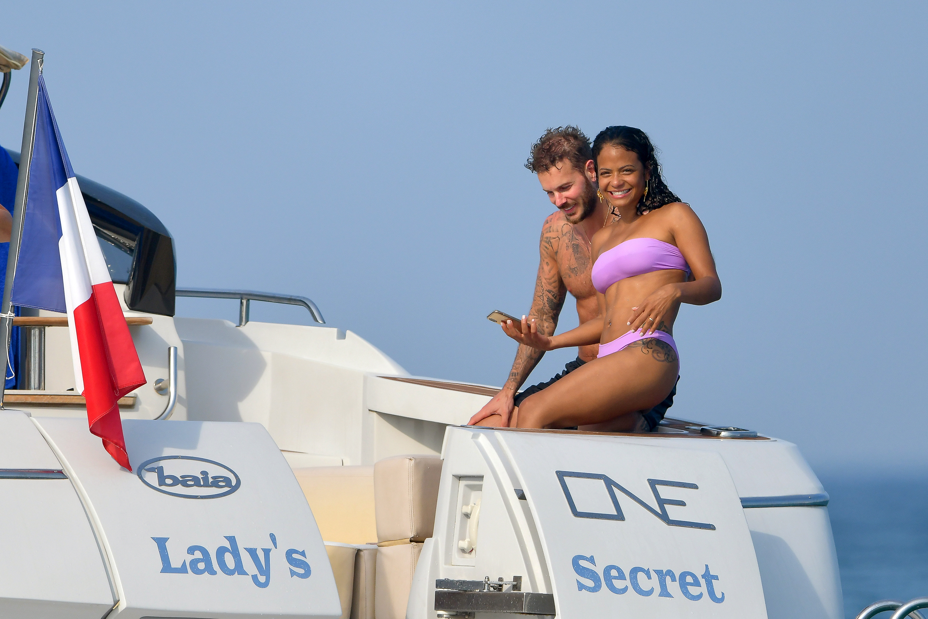 Christina Milian pokies and cameltoe in sexy bikini candids on a boat during holiday UHQ (13).jpg