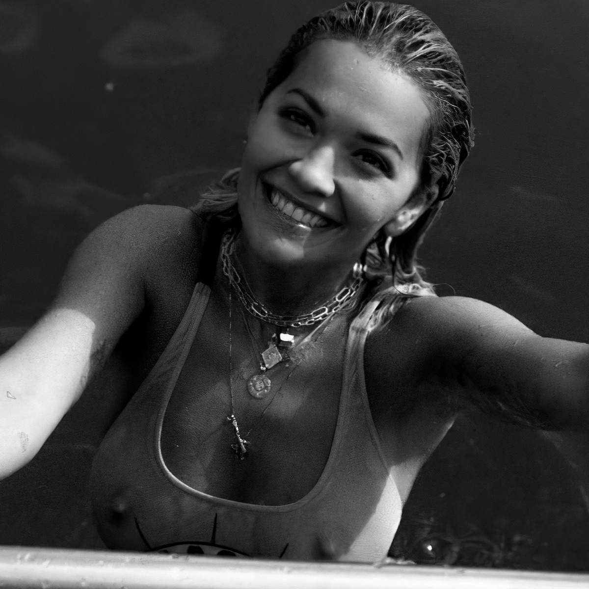 Rita Ora pokies in wet see thru swimsuit UHQ (2).jpg